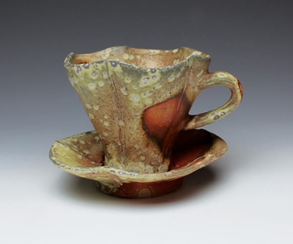 2 Casey Beck’s cup and saucer, 6 in. (15 cm) in width, soda-fired white stoneware, 2022. 