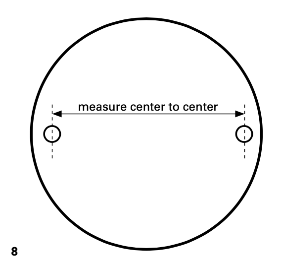 8 Measure the distance between the centers of the pins on your wheel head.
