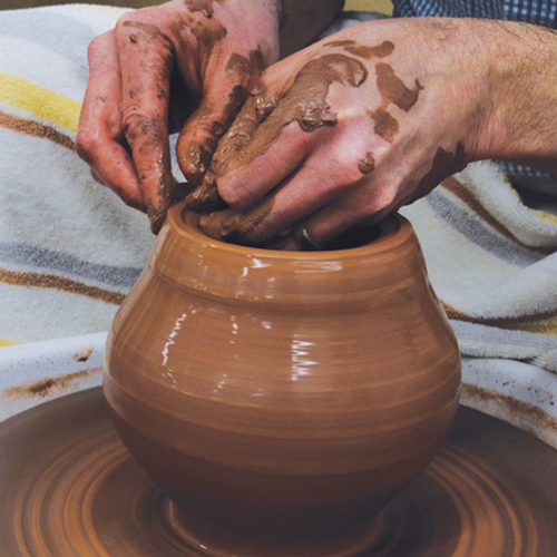 1 Throw a round-bellied pot. Create a gallery for the infuser to sit in. Compress, refine, and smooth the shape.