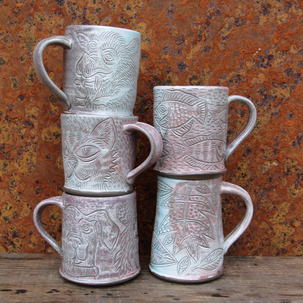 Low-fire wood-fired cups, Alligator MC217 clay body (altered), Val Cushing’s Opaque Gloss Glaze (altered), fired to cone 1.