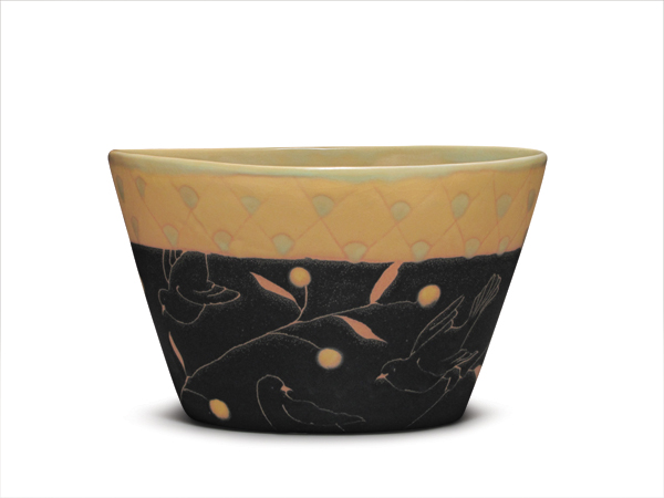 3 Bowl, 8 in. (20 cm) in height, layered Polseno Watery Yellow, Polseno Peach, and Polseno Black glazes, mid-range white casting slip, fired to cone 5 in oxidation.