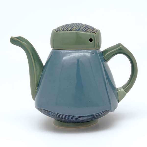 4 Frank Saliani’s Squarish Teapot, 8 in. (20 cm) in height, colored, cast, and assembled porcelain, fired to cone 6, 2021. 