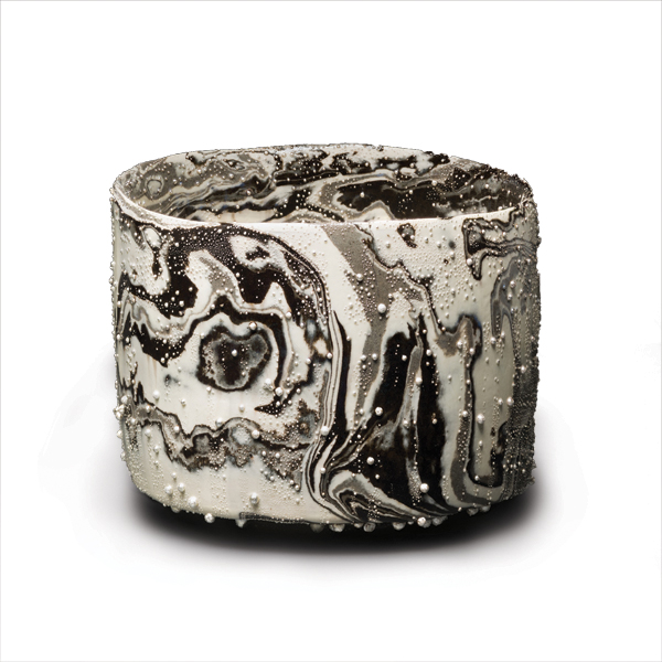 1 Takahiro Kondo’s Tsunami, 4 in. (12 cm) in height, marbleized porcelain, silver mist overglaze, 2015. Photo: Tomas Svab.