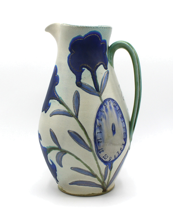 1 Julia Galloway’s Pitcher with Clock and Flowers, 11½ in. (29 cm) in height, wheel-thrown porcelain, inlay, glaze, fired in a mid-range soda kiln, 2022. Photo: Radius Gallery.