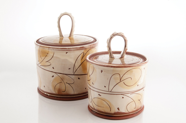 2 Jennifer Hall’s lidded pots, 7 in. (18 cm) in height, slip-decorated red earthenware, glaze, fired to 1940°F (1060°C), 2016. Photo: Joe Purches.