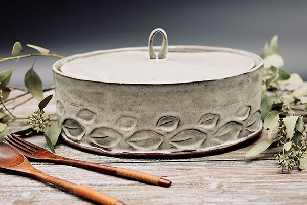 Casserole dish, 10 in. (25 cm) in length, handbuilt red earthenware, fired to cone 5 in an electric kiln. 