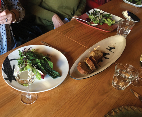 3 View of a salad course served on one of the student-designed plates.