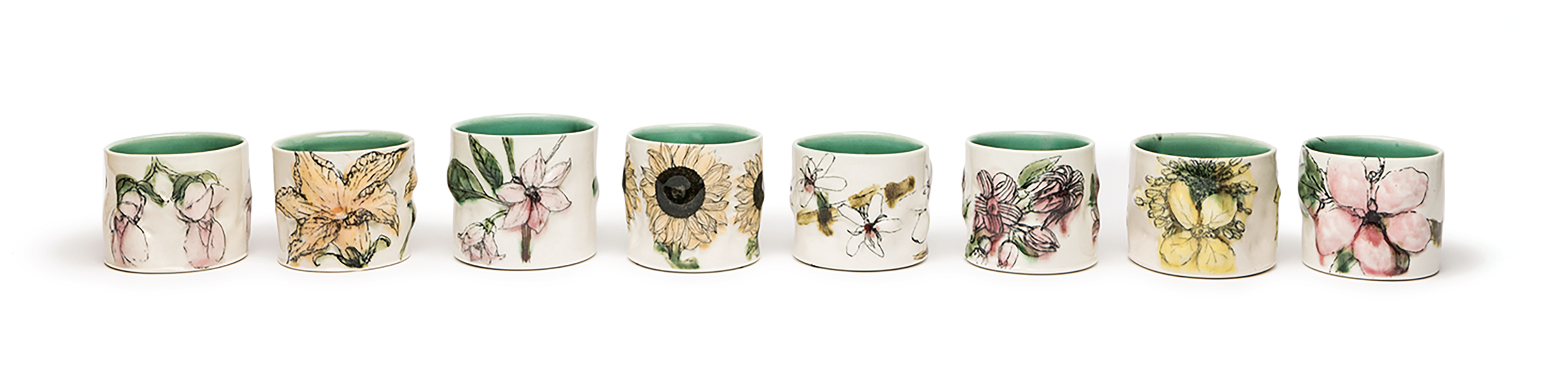 1 Anna Metcalfe’s Pop-up Pollinator Picnic (installation detail), 3 in. (8 cm) in diameter (each), porcelain, glaze, transfer prints, 2016–2021. Photo: Renee Yamada. 