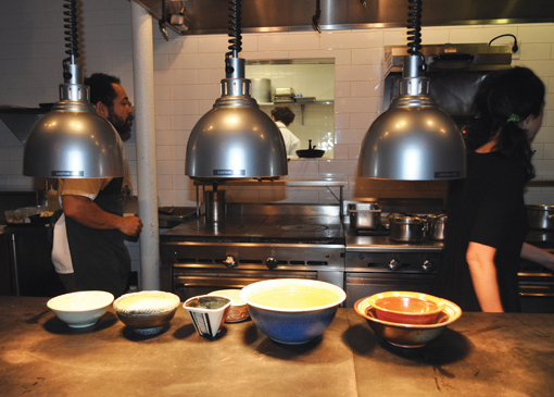 4 View of several bowls made by students in the class awaiting use by the restaurant staff.