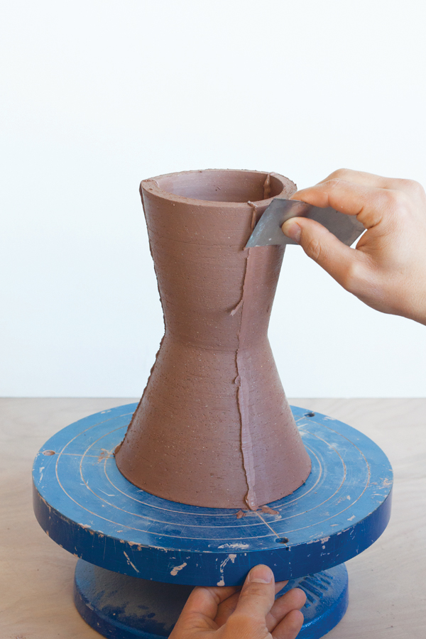 7 After scoring, slipping, and reattaching, allow the slip to become almost leather hard before cleaning it up with a steel rib.