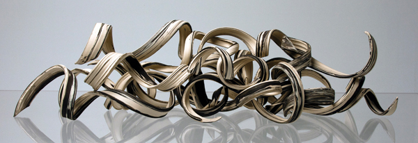 Heidi McKenzie’s self reflection, 3 ft. 6 in. (1 m) in length, thrown and altered black-and-white stoneware, 2012.