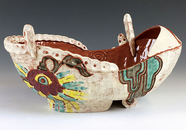 12 Amy Henson’s serving boat, 11 in. (28 cm) in length, red earthenware, fired to cone 04 in an electric kiln. 