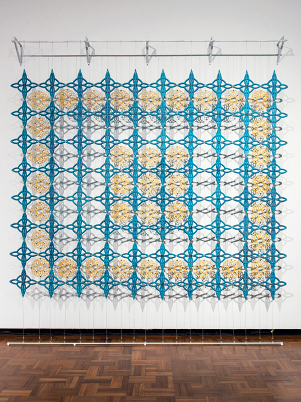 4 Eliza Au’s Lattice Screen (front view), 10 ft. (3 m) in length, stoneware, 2021. Photo: Stephanie Gerhart. 