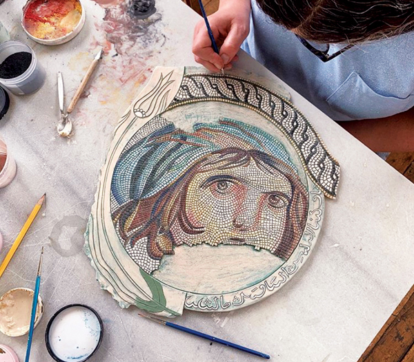 Gökden Alpman Matthews working on Woman of Anatolia, Zeugma, 2021. Photo: Eliah McCutchen. 