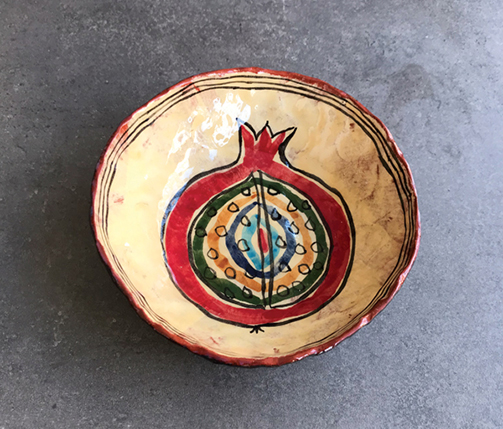 9 Bowl, 6 in. (15 cm) in diameter, pinched red clay, underglaze, clear glaze, fired to cone 05, 2022. Photos: Hüma Önal. 