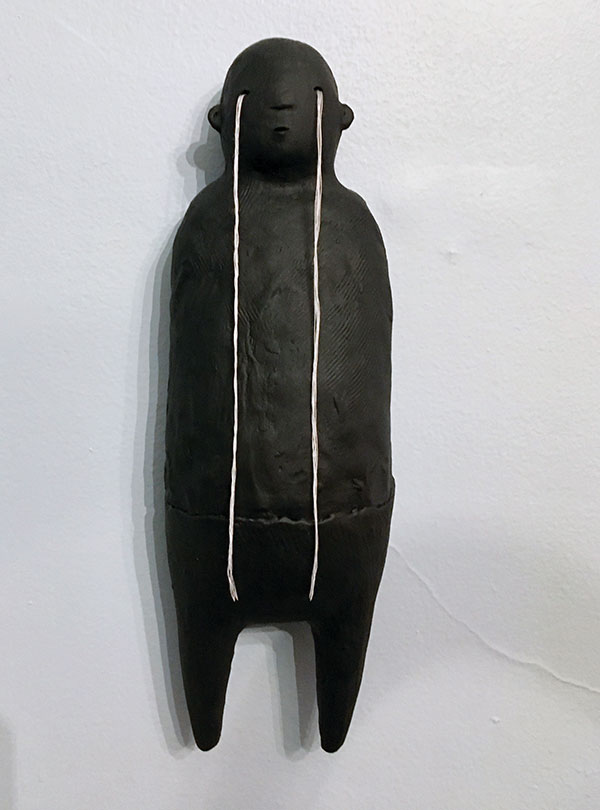 1 Jill Bell’s Cry Baby, 11 in. (28 cm) in height, ceramic, cotton thread, 2021.