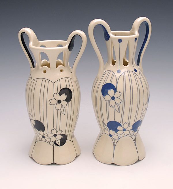 5 Pierced bud vases, to 10 in. (25 cm) in height, wheel-thrown mid-range porcelain, pulled handles, pierced, underglaze, and inlay decoration, glaze, fired to cone 7 in oxidation, 2019.