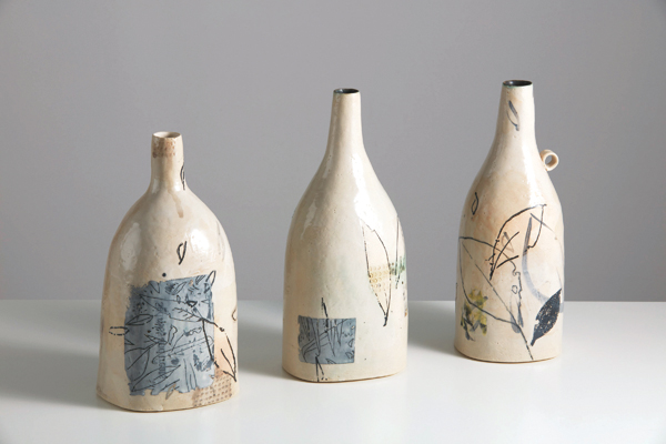 4 Fiona Thompson’s bottles (Contained Flora series), to 12½ in. (32 cm) in height, handbuilt stoneware, slips, glazes, lusters, decals. Photo: Alisdair Clark.
