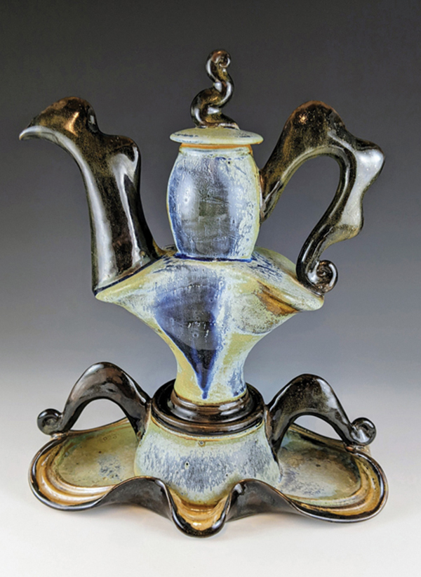 5 Steve Loucks’ Blue Folded Teapot on a Base with Wavy Handles, white stoneware, fired in gas reduction to cone 10, 2020.
