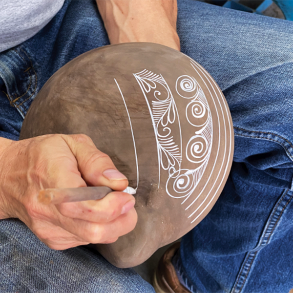 3 Demonstrating traditional brushwork patterns.