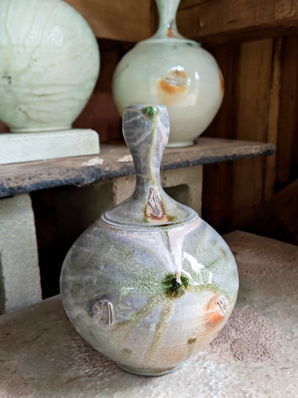 5 Bottle, porcelain, ash glaze, fired in a wood kiln to cone 12.