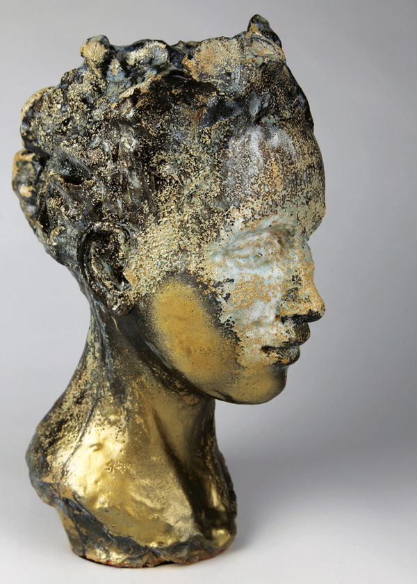 17 Heidi Moller Somsen’s Erosion #2, 16 in. (41 cm) in height, mid-range stoneware, glazes, fired to cone 5 in oxidation, gold spray paint, 2020.