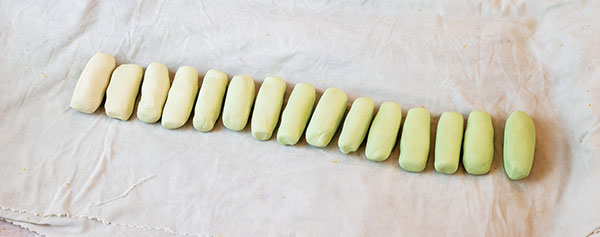 4 Blend each pair of colored-clay and white-porcelain segments. Be sure to keep the blended pieces in the correct sequence.
