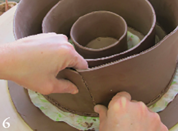 Work from the smallest to the largest bowl. Bevel, then attach the ends of the wall slabs.