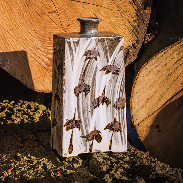 3 Phil Rogers’ tall bottle, 10½ in. (27 cm) in height, press-molded stoneware, hakeme with iron brush pattern.