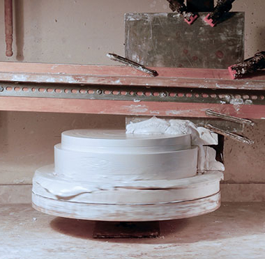 15 Turning the outside of the mold, which allows it to be centered on a wheel when in use. 