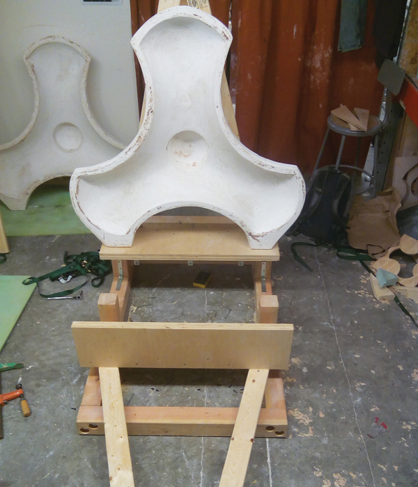 9 One of the mold halves shown on the wooden support mechanism.