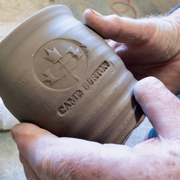 3 Custom stamped mug ready for trimming and handle attachment.