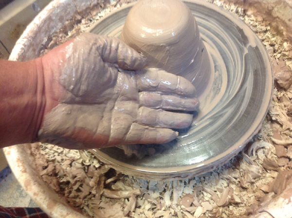 2 Medium slip coats the hand with some oozing through the fingers.