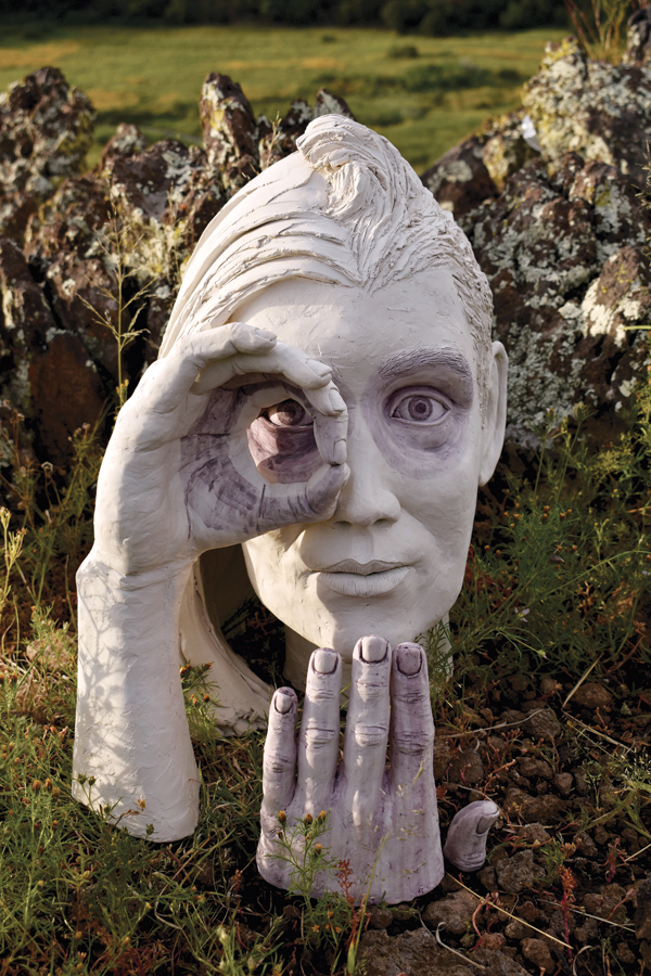 1 Magda Gluszek’s Rose Colored and Red Handed, 18 in. (46 cm) in height, unfired clay, cochineal, 2022. 