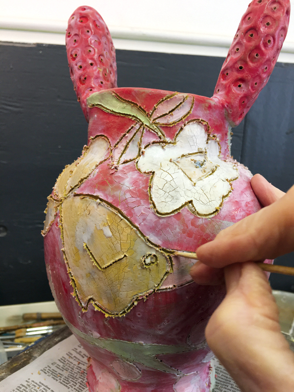 9 Let the vase dry under plastic to set up, then use a wooden skewer to outline the drawing through the wax.