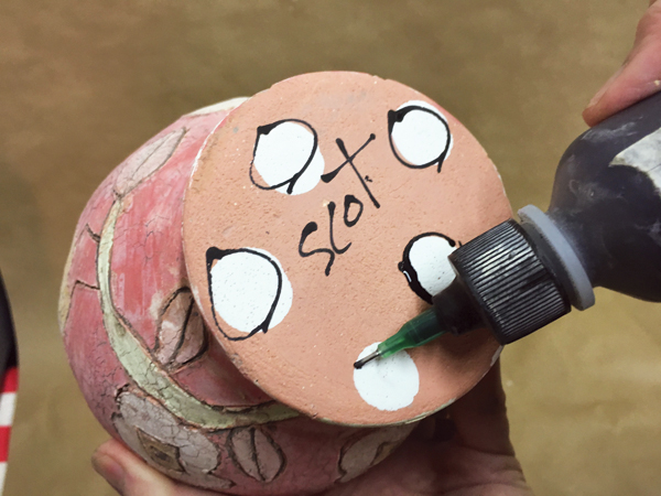 12 I decorate the underside of my pots with underglaze. Underglaze won’t stick to kilns shelves during a firing.
