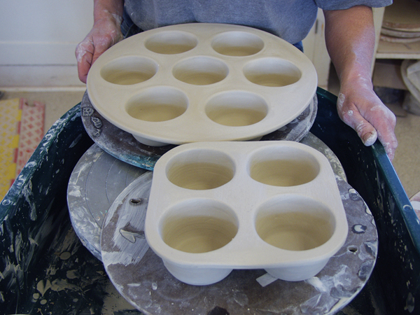 7 For a four-cup pan, use a ruler to cut off the edges of the pan. Use a Surform rasp to finish the cut edges. 