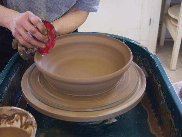 1 Create a 10-inch-wide bowl with a slight curve where the floor meets the wall. Pull out the top ½ inch to create a gallery.