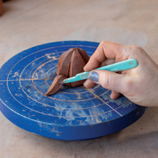 4 Work slowly and steadily to cut the ridges, making all the cuts in one direction, then the other. 