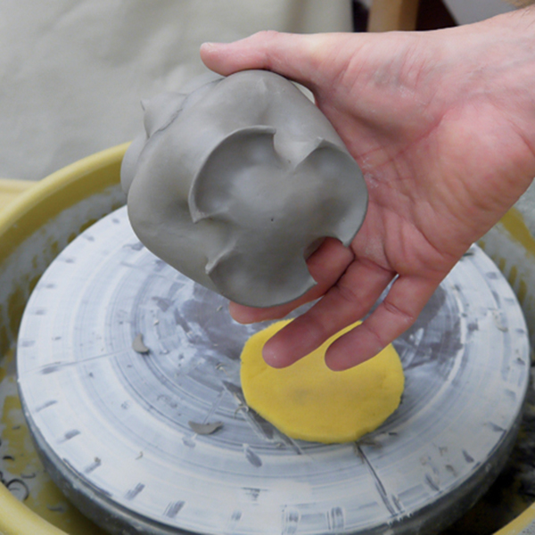 4 Sculpt the bottom to match the contours of the walls with minimal cracking. 