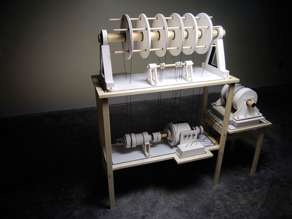 Kwok Pong (Bobby) Tso’s The Moment of “Re”inventing—Motionality, 4 ft. 7 in. (1.4 m) in height, white earthenware, wood, plastic, paint, fabric, glass.