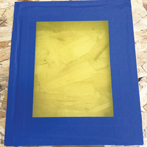1 Apply tape around the perimeter of the screen side of the frame.