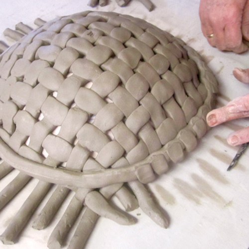 6 Smooth and compress the cut coils as you go to remove sharp edges and compress the join. 