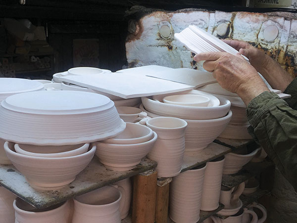 9 The top shelf in the car kiln with tumble-stacked square plates and pie plates on the top layer (alternate view).