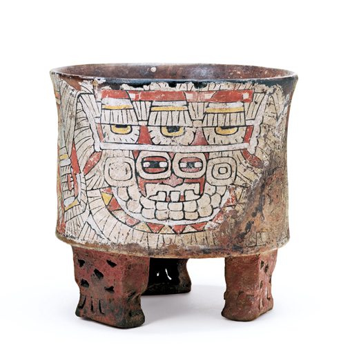 3 Tripod vessel with goggle-eyed deity painted on stucco, 450–550 CE. 