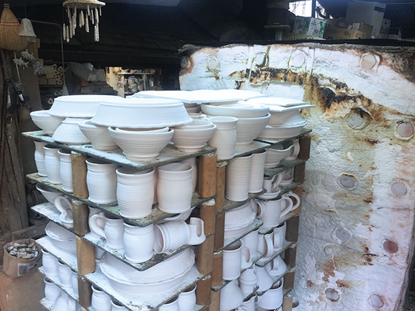 10 Car-kiln bisque firing with completed tumble-stacked top layer.