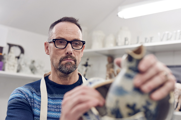 3 Bouke De Vries reconstructing a ceramic vessel. Photo: Tim Higgins.