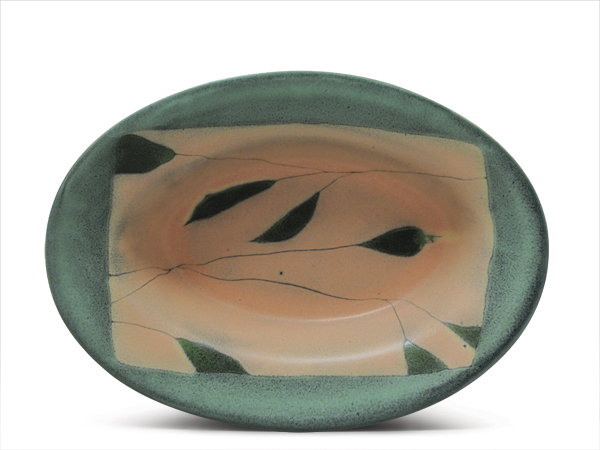 2 Oval dish, 9 in. (18 cm) in width, Polseno Peach with additional glazes, mid-range white casting slip, fired to cone 5 in oxidation.