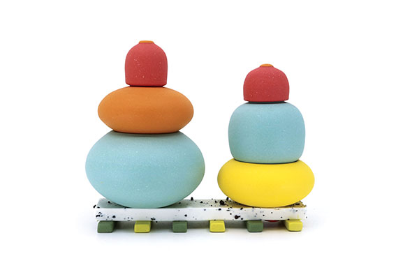 1 Chris Alveshere’s Jar Twosome, 6½ in. (17 cm) in length, colored porcelain, crushed brick inclusions, fired to cone 10 in oxidation, 2021. 