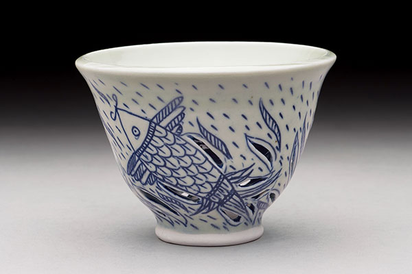 23 Tripti Yoganathan’s Matsya Double Wall Teabowl, 5½ in. (14 cm) in diameter, porcelain, fired to cone 10 in reduction. 